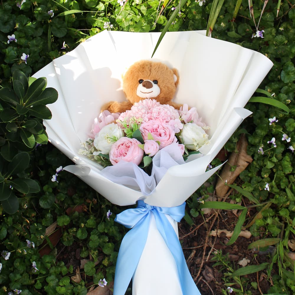 Flower bouquet with teddy bear on sale