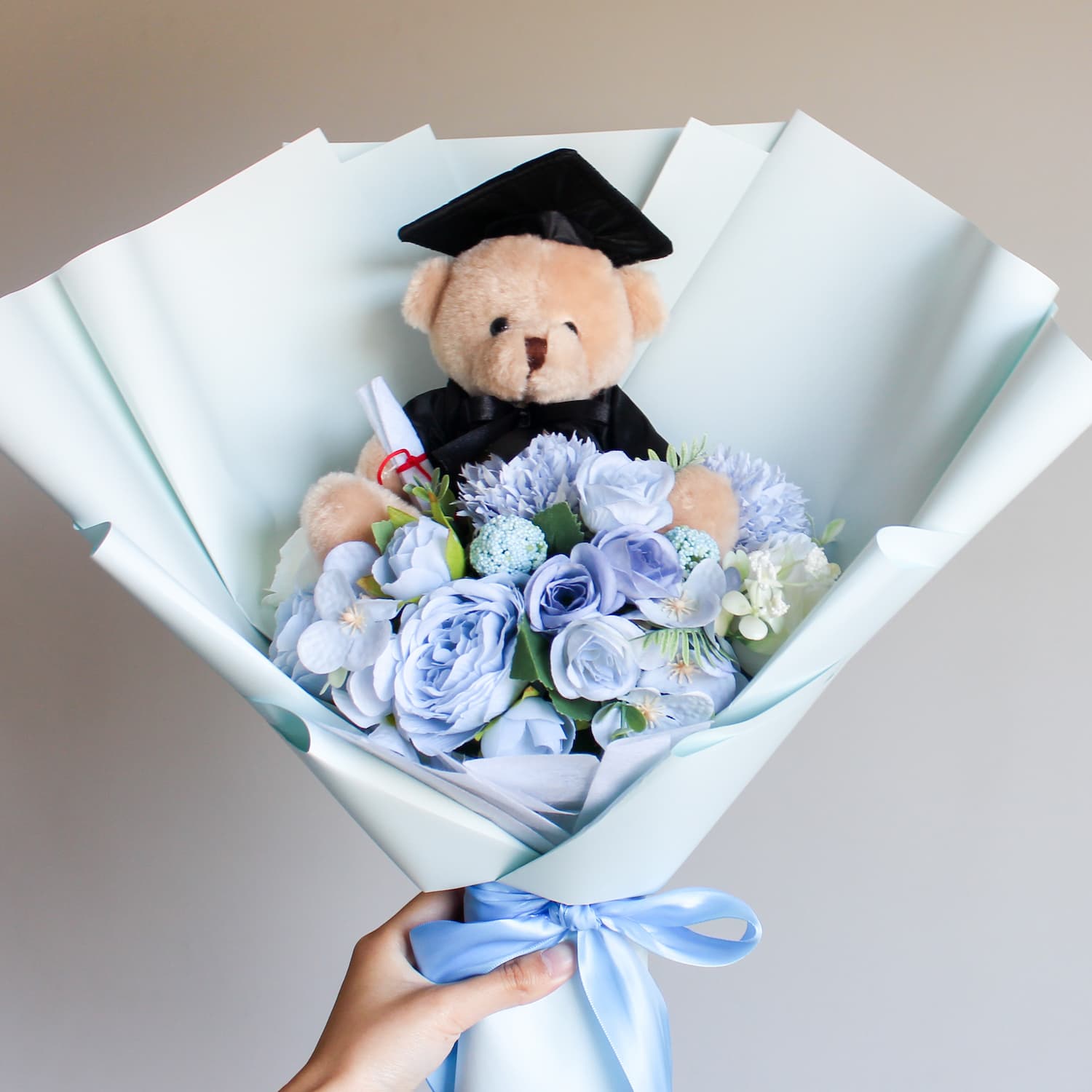 blue graduation bear bouquet flowers